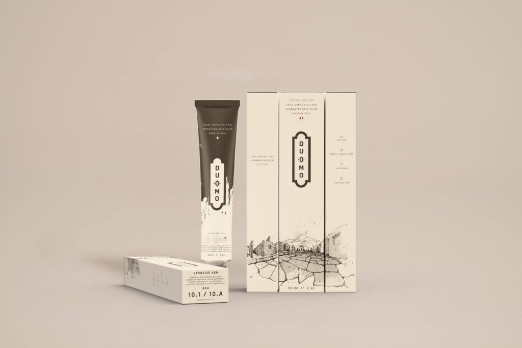 Duomo 10.1 / 10A - Vesuvius Ash - Ash hair color tube and boxes on a beige backdrop
