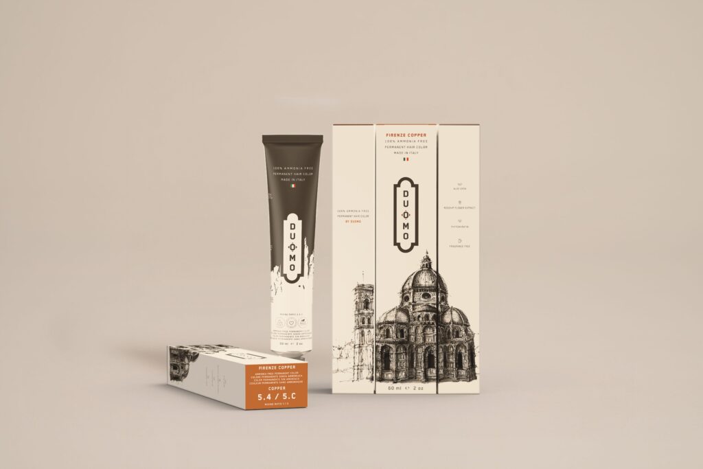 Duomo 5.4 / 5C - Firenze Copper Copper hair color tube and boxes on a beige backdrop