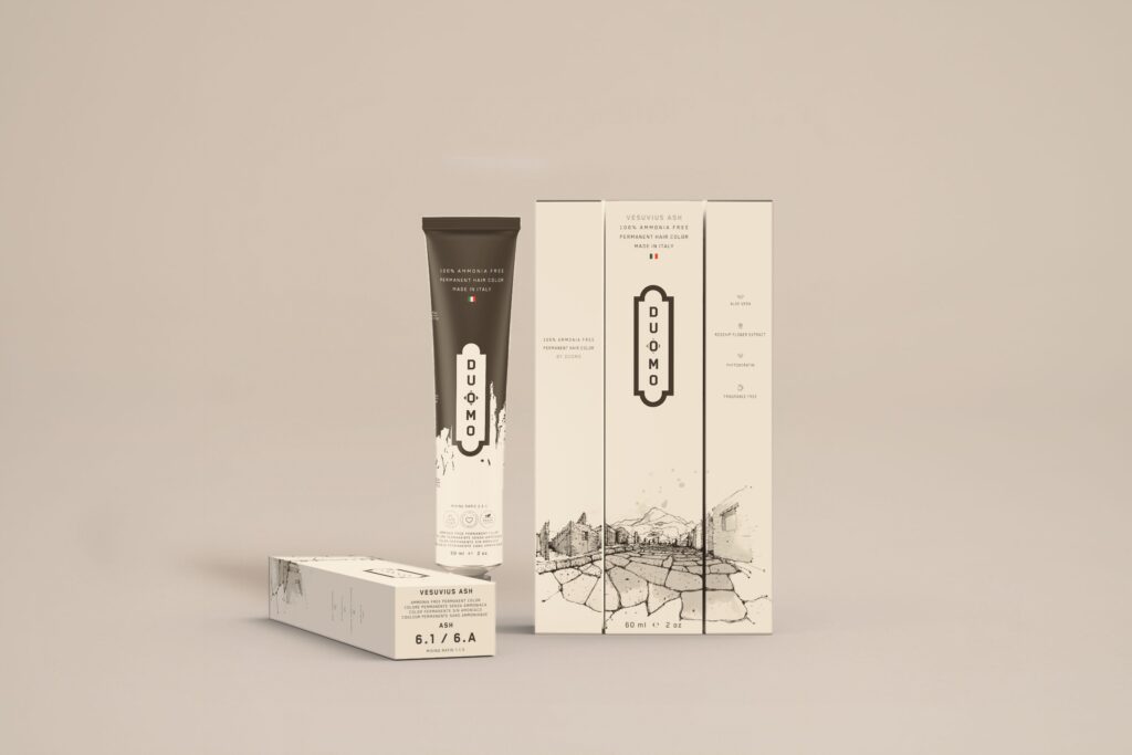 Duomo 6.1 / 6A - Vesuvius Ash Ash hair color tube and boxes on a beige backdrop
