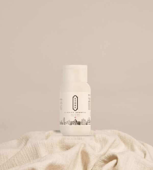 Duomo Clarify Shampoo 100 mL on natural linen cloth