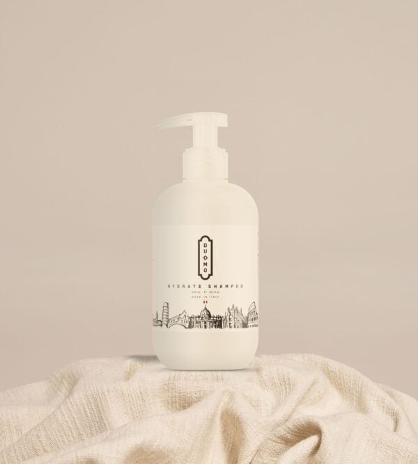 Duomo Hydrate Shampoo 300 ML on natural linen cloth