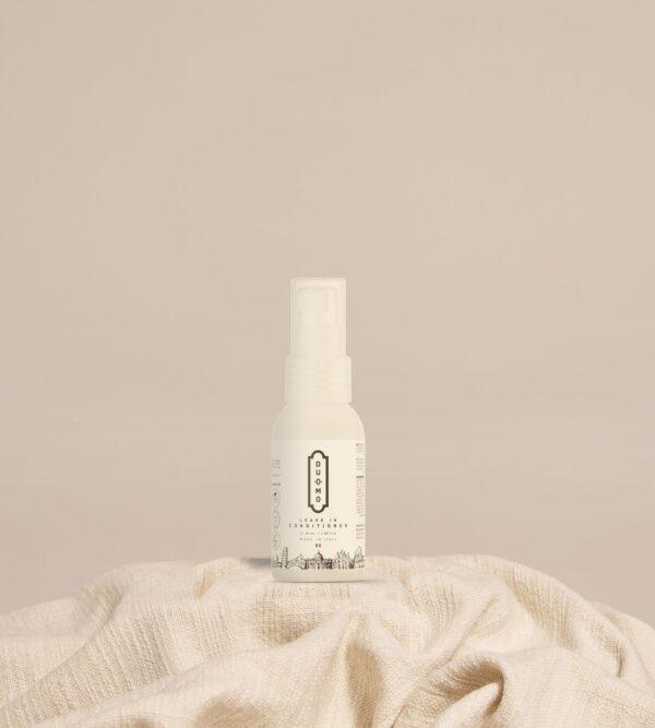 Duomo Leave In Conditioner 50 mL on natural linen cloth