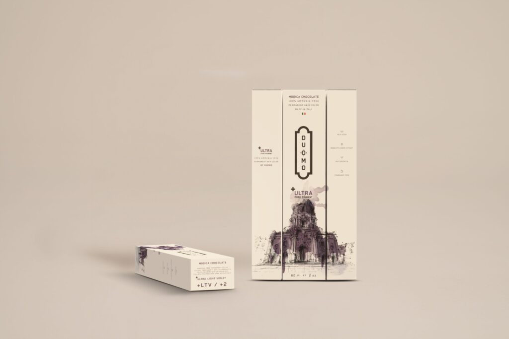 Duomo LTV+ Ultra Light Violet hair color tube and boxes on a beige backdrop